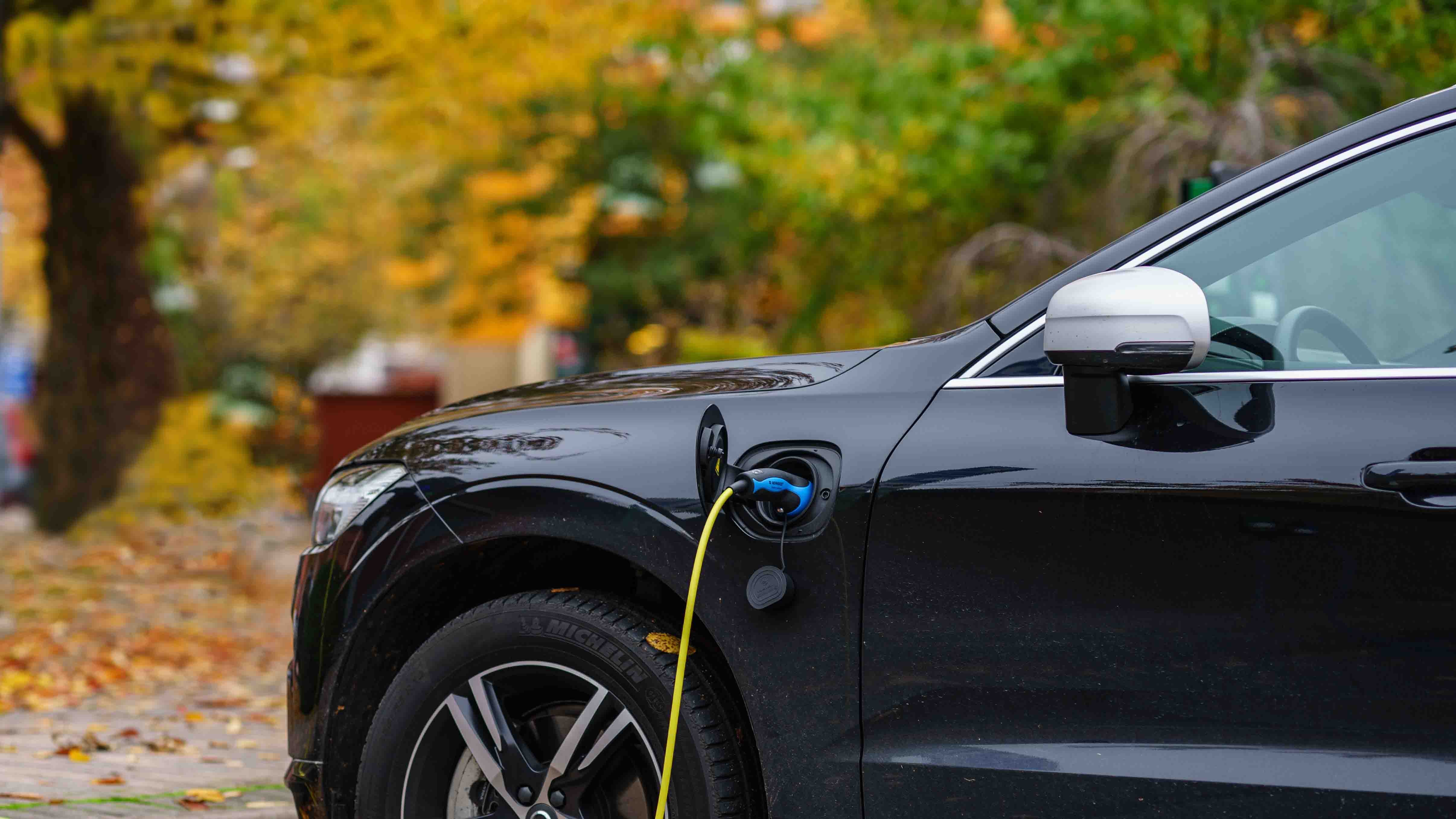 charging electric company car at home